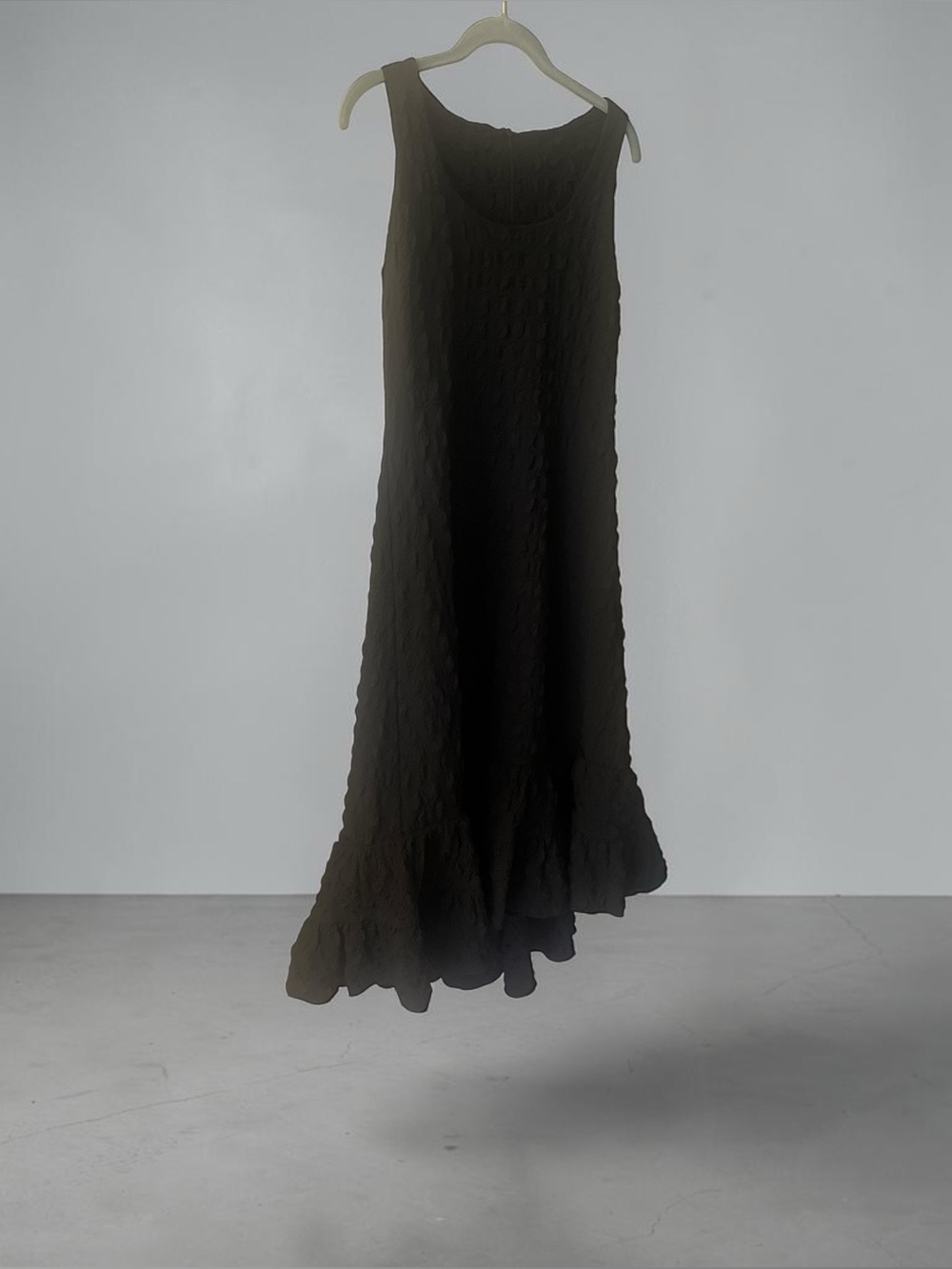 Elegant Black Textured Maxi Skirt with Ruffled Hem